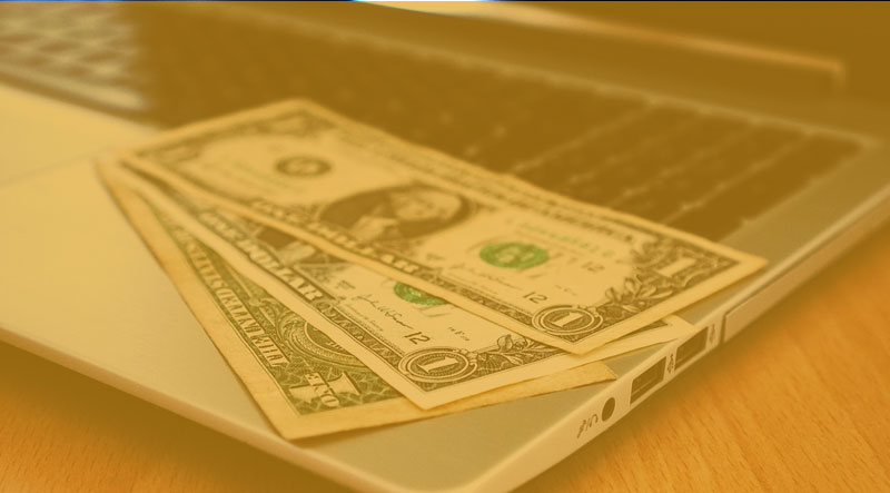 money laptop - Wie würde die Legalisierung von Sportwetten in den USA den Sport beeinflussen?